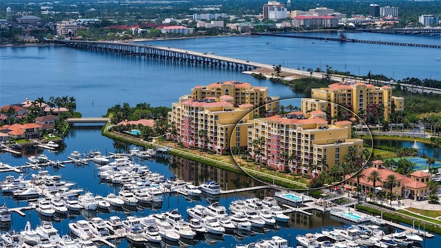 606 Riviera Dunes Way Unit 306, Palmetto, FL 34221 - drone / aerial view of a notable bridge, a nearby body of water, and a marina
