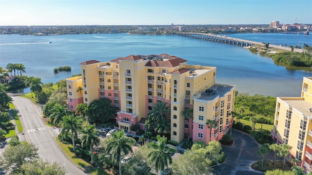 606 Riviera Dunes Way Unit 306, Palmetto, FL 34221 - drone / aerial view of apartment complex, a notable bridge, and a large body of water