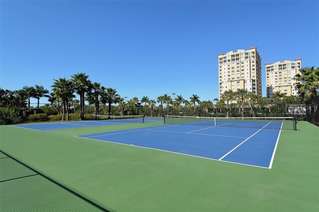 606 Riviera Dunes Way Unit 306, Palmetto, FL 34221 - view of tennis court featuring fence and community basketball court