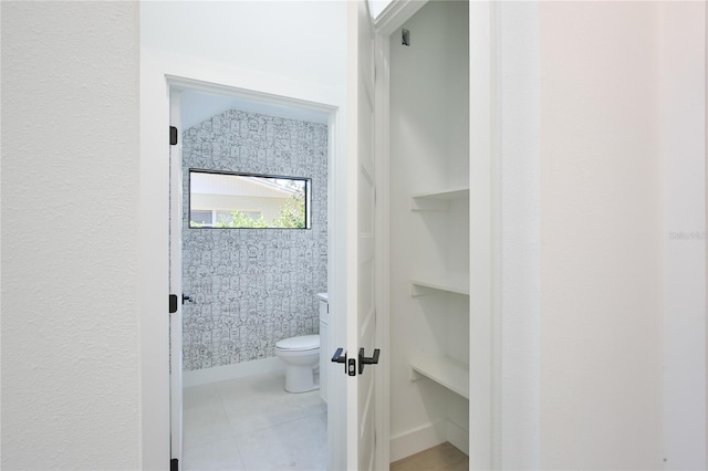 2335 Oak Ter, Sarasota, FL 34231 - bathroom featuring toilet and tile patterned floors