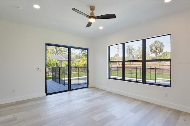 2335 Oak Ter, Sarasota, FL 34231 - unfurnished room with light wood finished floors, recessed lighting, baseboards, and a ceiling fan