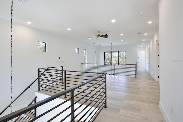 2335 Oak Ter, Sarasota, FL 34231 - corridor with an upstairs landing, recessed lighting, baseboards, and light wood-style flooring