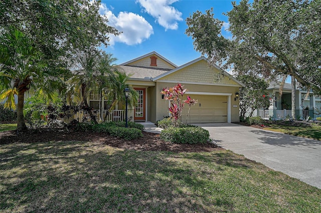 12149 Forest Park Cir, Bradenton, FL 34211 - view of front of home with a garage, driveway, a front lawn, and stucco siding