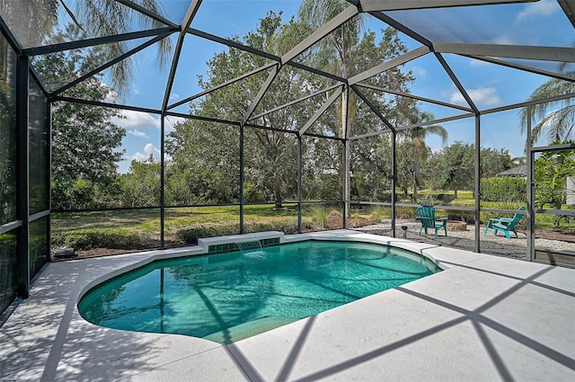 12149 Forest Park Cir, Bradenton, FL 34211 - outdoor pool featuring a patio area, view of scattered trees, and a lanai