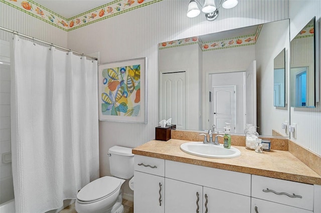12149 Forest Park Cir, Bradenton, FL 34211 - bathroom featuring wallpapered walls, vanity, toilet, and shower / bathtub combination with curtain