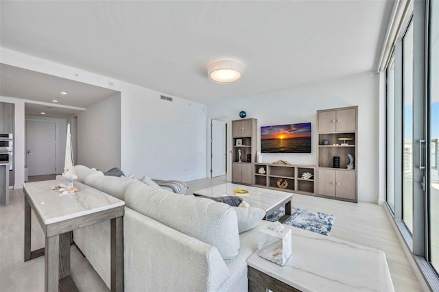 301 Quay Commons Unit 1711, Sarasota, FL 34236 - living area with light wood finished floors