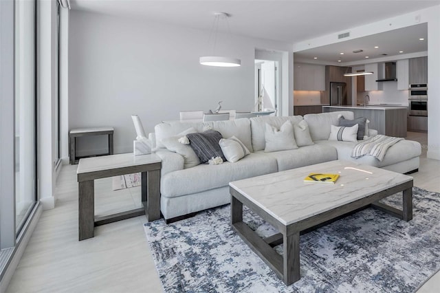 301 Quay Commons Unit 1711, Sarasota, FL 34236 - living room with recessed lighting