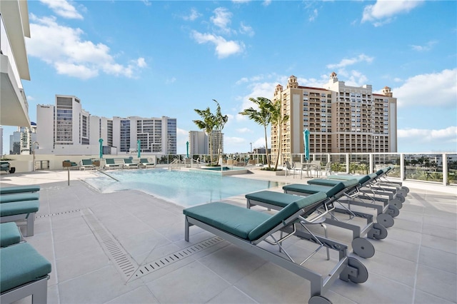 301 Quay Commons Unit 1711, Sarasota, FL 34236 - community pool featuring a patio