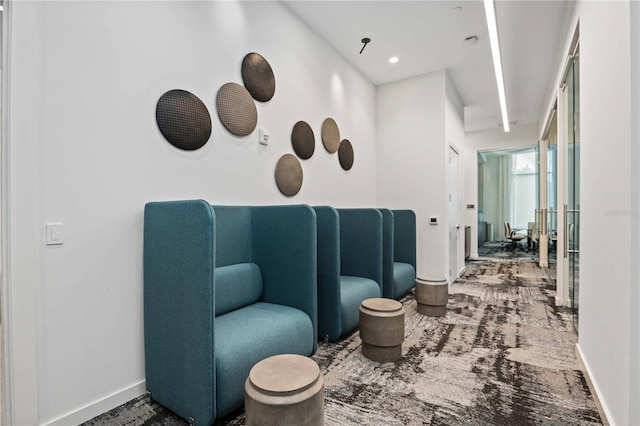 301 Quay Commons Unit 1711, Sarasota, FL 34236 - living area with baseboards and carpet flooring