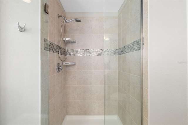 bathroom featuring a stall shower