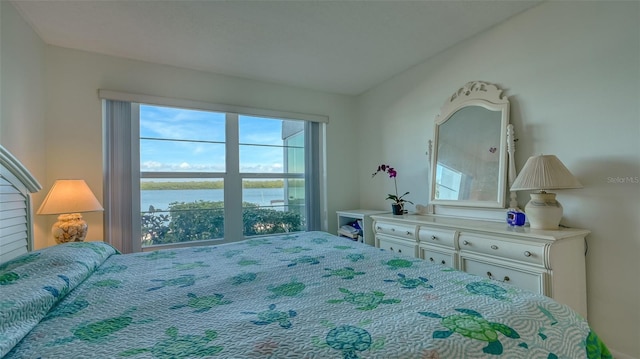 4420 Exeter Dr Unit L104, Longboat Key, FL 34228 - bedroom featuring a water view