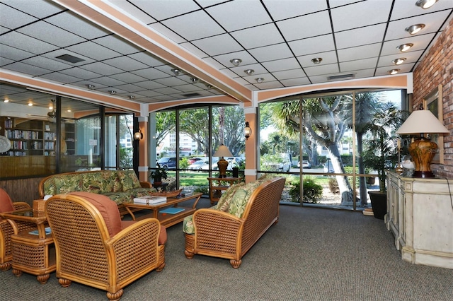 4420 Exeter Dr Unit L104, Longboat Key, FL 34228 - sunroom with a paneled ceiling and carpet
