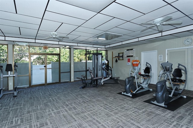 4420 Exeter Dr Unit L104, Longboat Key, FL 34228 - workout area featuring a ceiling fan and carpet