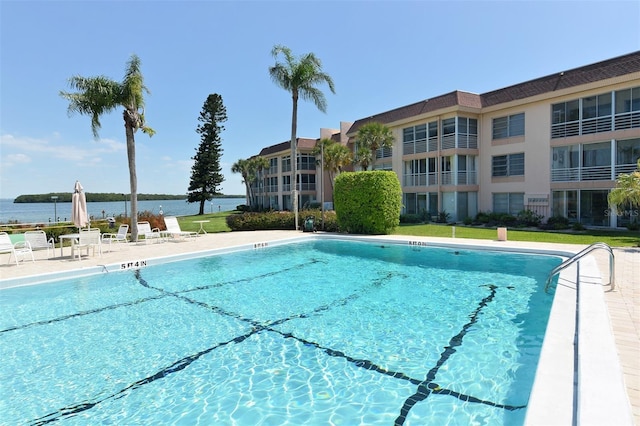 4420 Exeter Dr Unit L104, Longboat Key, FL 34228 - community pool featuring a water view