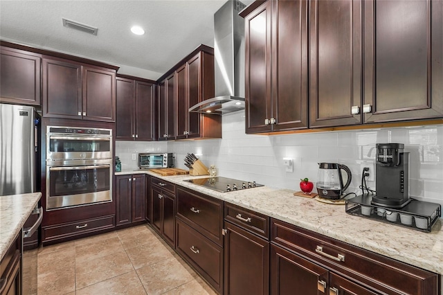 2745 62nd Ave E, Ellenton, FL 34222 - kitchen with wall chimney exhaust hood, appliances with stainless steel finishes, decorative backsplash, and light stone counters