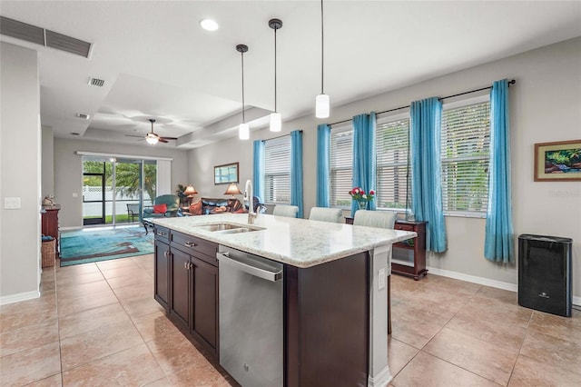 2745 62nd Ave E, Ellenton, FL 34222 - kitchen featuring stainless steel dishwasher, a sink, a raised ceiling, baseboards, and recessed lighting