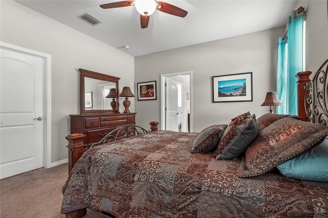 2745 62nd Ave E, Ellenton, FL 34222 - carpeted bedroom featuring a ceiling fan and ensuite bathroom