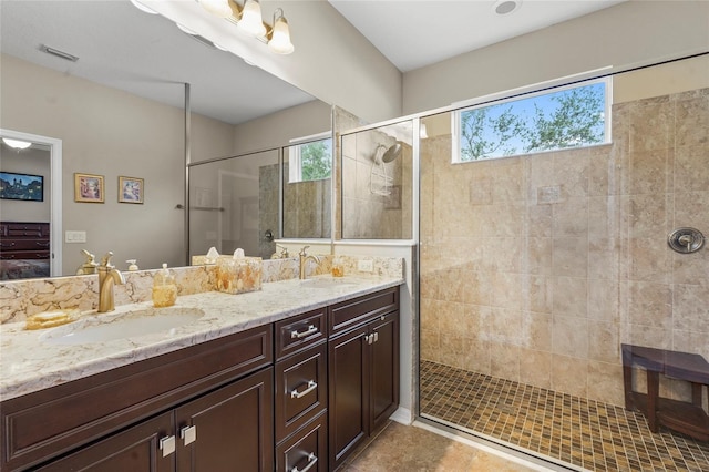2745 62nd Ave E, Ellenton, FL 34222 - ensuite bathroom featuring a tile shower and double vanity