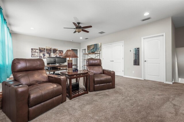 2745 62nd Ave E, Ellenton, FL 34222 - carpeted living room featuring a ceiling fan, a desk, baseboards, and recessed lighting