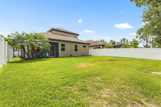 2745 62nd Ave E, Ellenton, FL 34222 - back of house with a tiled roof, stucco siding, and a sunroom