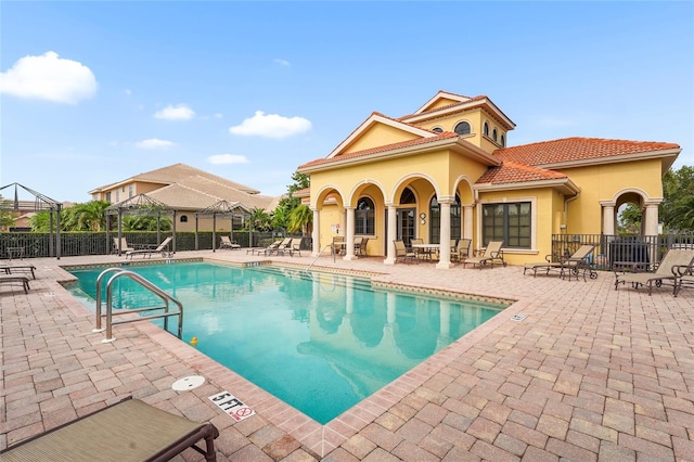 2745 62nd Ave E, Ellenton, FL 34222 - community pool with fence and a patio area