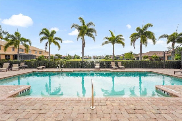 2745 62nd Ave E, Ellenton, FL 34222 - community pool with fence and a residential view