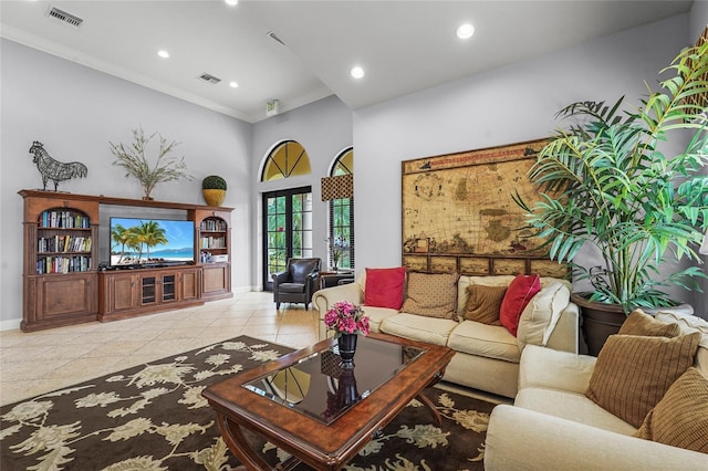 2745 62nd Ave E, Ellenton, FL 34222 - living area featuring crown molding, baseboards, recessed lighting, a towering ceiling, and tile patterned floors