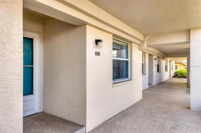 7301 29th Avenue Dr W Unit 108, Bradenton, FL 34209 - view of exterior entry with stucco siding