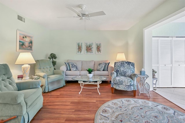 7301 29th Avenue Dr W Unit 108, Bradenton, FL 34209 - living room with ceiling fan and wood finished floors