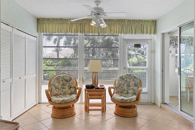 7301 29th Avenue Dr W Unit 108, Bradenton, FL 34209 - sunroom with healthy amount of natural light, tile patterned floors, and a textured ceiling