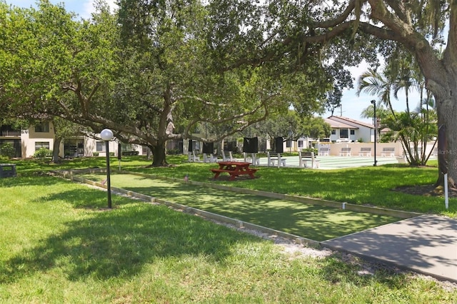 7301 29th Avenue Dr W Unit 108, Bradenton, FL 34209 - view of property's community featuring a game area and a lawn