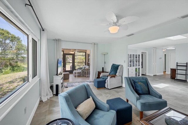 3500 Green View Ct Unit 45, Sarasota, FL 34231 - living area with baseboards and ceiling fan