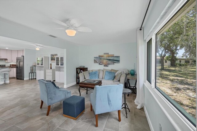 3500 Green View Ct Unit 45, Sarasota, FL 34231 - living room featuring a ceiling fan and baseboards