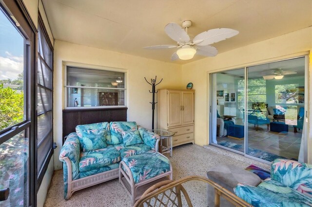 3500 Green View Ct Unit 45, Sarasota, FL 34231 - sunroom / solarium featuring an outdoor living space, a ceiling fan, and carpet