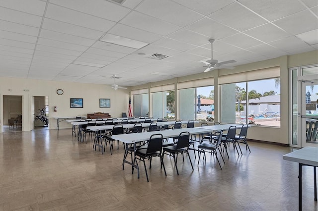 3500 Green View Ct Unit 45, Sarasota, FL 34231 - dining area featuring ceiling fan, a paneled ceiling, and baseboards