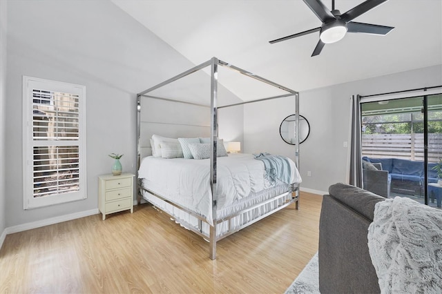 4079 Woodview Dr, Sarasota, FL 34232 - bedroom with access to outside, vaulted ceiling, baseboards, light wood-type flooring, and ceiling fan