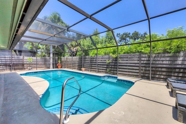 4079 Woodview Dr, Sarasota, FL 34232 - view of pool with a fenced backyard, a patio area, and a lanai