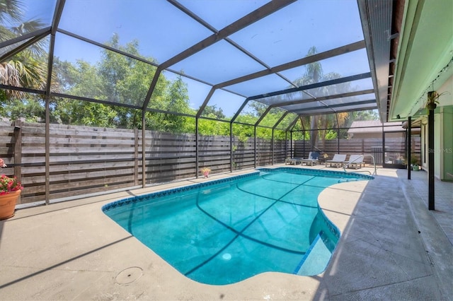 4079 Woodview Dr, Sarasota, FL 34232 - view of swimming pool featuring a patio area, a fenced backyard, and a lanai