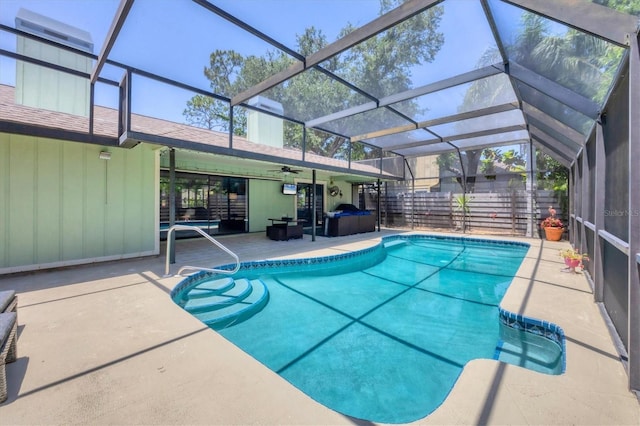 4079 Woodview Dr, Sarasota, FL 34232 - view of swimming pool featuring ceiling fan, a patio, a lanai, and fence
