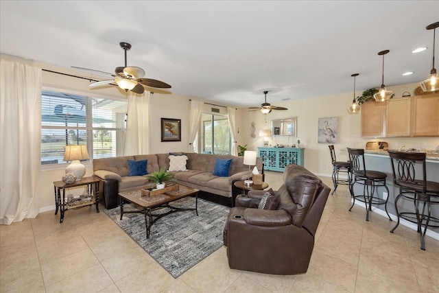 3230 Magnolia Landing Ln, North Fort Myers, FL 33917 - living room featuring ceiling fan, light tile patterned floors, baseboards, and recessed lighting