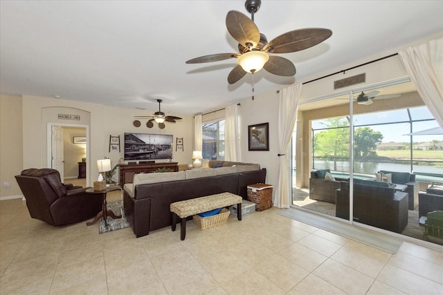 3230 Magnolia Landing Ln, North Fort Myers, FL 33917 - living area with a ceiling fan and light tile patterned floors