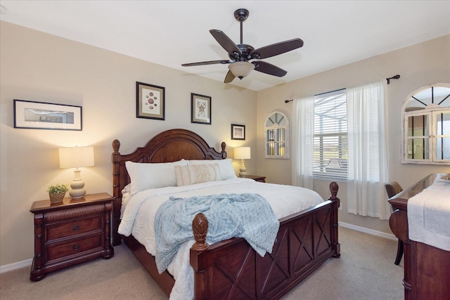 3230 Magnolia Landing Ln, North Fort Myers, FL 33917 - bedroom with light carpet, baseboards, and a ceiling fan