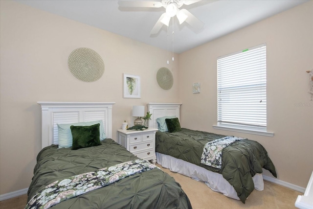 3230 Magnolia Landing Ln, North Fort Myers, FL 33917 - carpeted bedroom featuring baseboards, multiple windows, and a ceiling fan