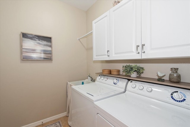 3230 Magnolia Landing Ln, North Fort Myers, FL 33917 - washroom featuring independent washer and dryer, cabinet space, and baseboards
