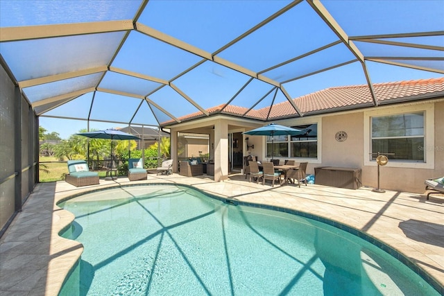 3230 Magnolia Landing Ln, North Fort Myers, FL 33917 - swimming pool featuring a patio area, glass enclosure, and outdoor dining area