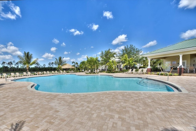 3230 Magnolia Landing Ln, North Fort Myers, FL 33917 - community pool featuring a patio area