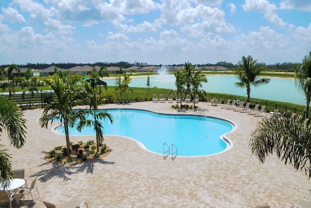 3230 Magnolia Landing Ln, North Fort Myers, FL 33917 - community pool featuring fence, a water view, and a patio