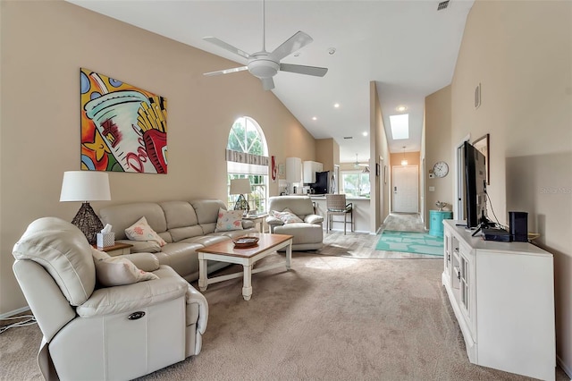 1322 Perico Point Cir, Bradenton, FL 34209 - living area featuring high vaulted ceiling, ceiling fan, and light carpet