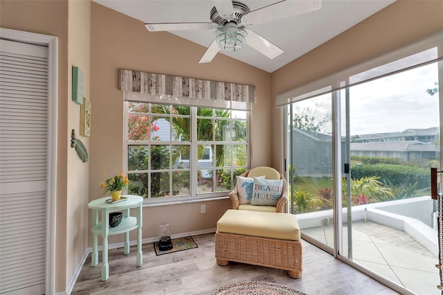 1322 Perico Point Cir, Bradenton, FL 34209 - living area with a ceiling fan, healthy amount of natural light, wood finished floors, and vaulted ceiling