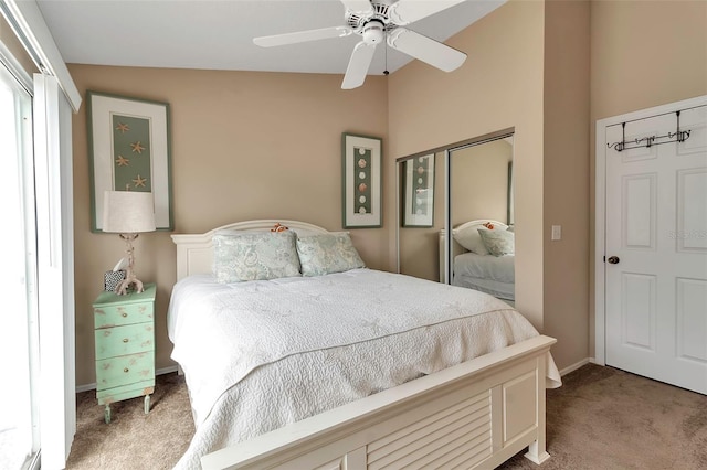 1322 Perico Point Cir, Bradenton, FL 34209 - bedroom featuring carpet floors, lofted ceiling, ceiling fan, and baseboards